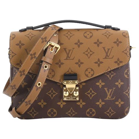 louis vuitton pouchette metis reverse